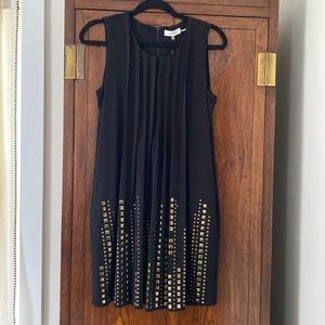 Calvin Klein black dress with gold tone grommet detail